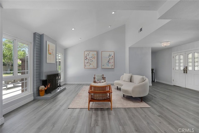 2861 Hillman St, Thousand Oaks, CA 91360 - living room featuring wood finished floors, a fireplace, recessed lighting, and high vaulted ceiling