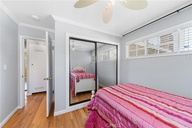 644 E Mountain View Ave, Glendora, CA 91741 - bedroom with crown molding, light wood finished floors, a closet, and ceiling fan