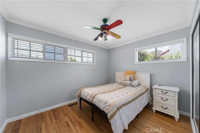 644 E Mountain View Ave, Glendora, CA 91741 - bedroom featuring wood finished floors, ornamental molding, a closet, and ceiling fan