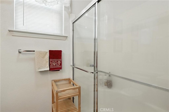 9790 Heatherhearst Dr, Chowchilla, CA 93610 - bathroom featuring a shower with shower door