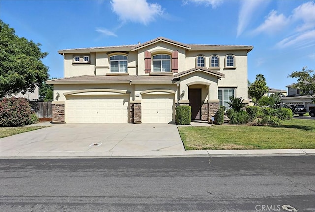 9790 Heatherhearst Dr, Chowchilla, CA 93610 - view of front facade with a garage, stucco siding, stone siding, and a front lawn