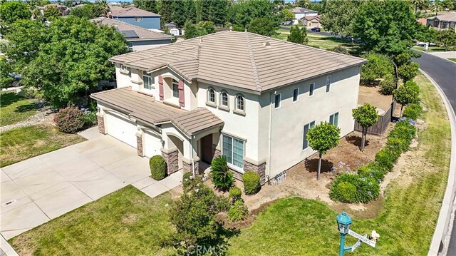 9790 Heatherhearst Dr, Chowchilla, CA 93610 - aerial perspective of suburban area