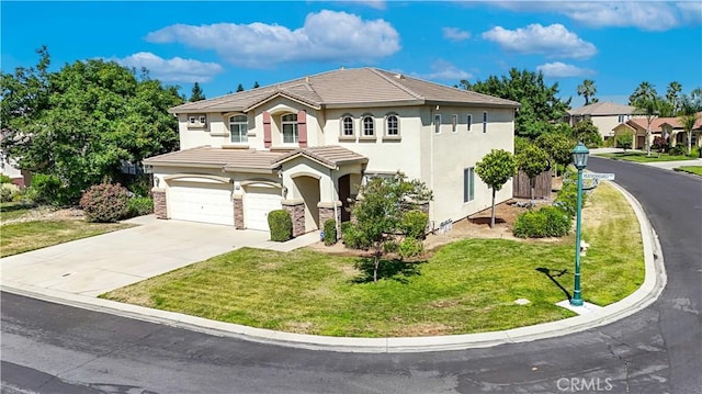 9790 Heatherhearst Dr, Chowchilla, CA 93610 - mediterranean / spanish house featuring an attached garage, stucco siding, concrete driveway, a tile roof, and a front lawn