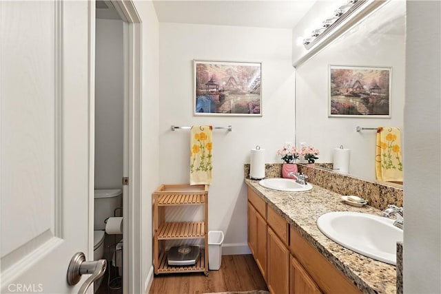 9790 Heatherhearst Dr, Chowchilla, CA 93610 - full bath featuring double vanity and wood finished floors