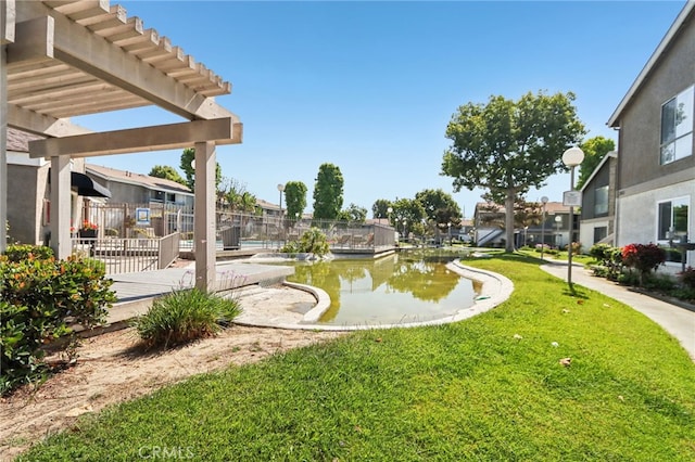 2827 S Fairview St Unit O, Santa Ana, CA 92704 - view of grassy yard featuring a pergola, a residential view, and a wooden deck