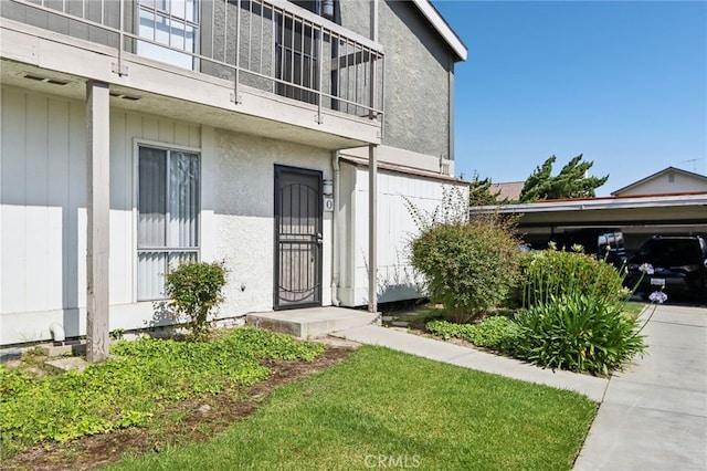 2827 S Fairview St Unit O, Santa Ana, CA 92704 - view of exterior entry featuring stucco siding