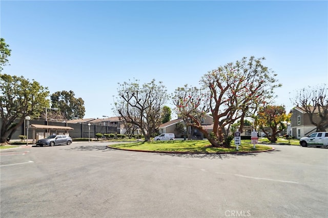 2827 S Fairview St Unit O, Santa Ana, CA 92704 - view of front of home featuring a residential view and uncovered parking