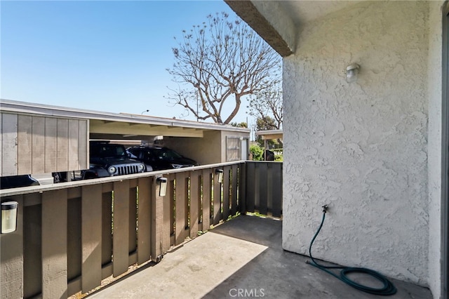 2827 S Fairview St Unit O, Santa Ana, CA 92704 - view of patio / terrace with a carport