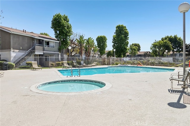 2827 S Fairview St Unit O, Santa Ana, CA 92704 - community pool featuring a patio area