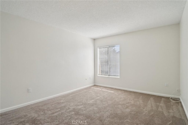 1010 W Macarthur Blvd Unit 24, Santa Ana, CA 92707 - empty room with carpet flooring and a textured ceiling