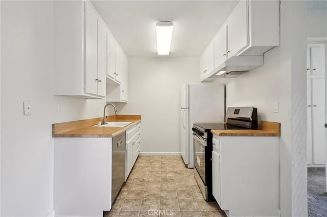 1010 W Macarthur Blvd Unit 24, Santa Ana, CA 92707 - kitchen featuring stainless steel appliances, white cabinets, and light countertops