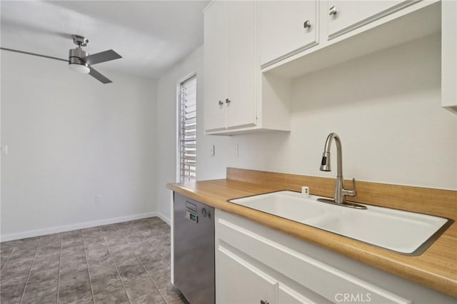 1010 W Macarthur Blvd Unit 24, Santa Ana, CA 92707 - kitchen featuring stainless steel dishwasher, ceiling fan, white cabinetry, and light countertops