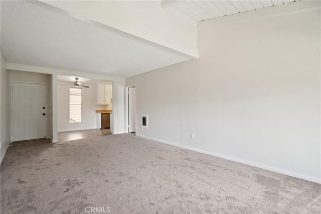 1010 W Macarthur Blvd Unit 24, Santa Ana, CA 92707 - unfurnished room with light colored carpet, beam ceiling, and a ceiling fan