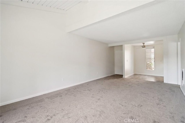 1010 W Macarthur Blvd Unit 24, Santa Ana, CA 92707 - spare room with carpet, ceiling fan, and beamed ceiling