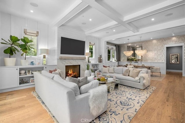 910 28th St, Manhattan Beach, CA 90266 - living room with light wood-style flooring, a fireplace, beam ceiling, and recessed lighting