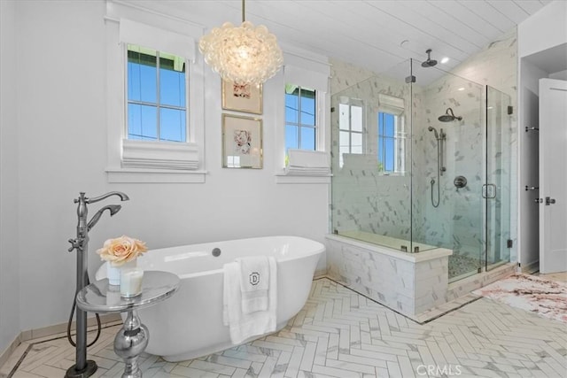 910 28th St, Manhattan Beach, CA 90266 - full bath with a marble finish shower, a soaking tub, and a chandelier