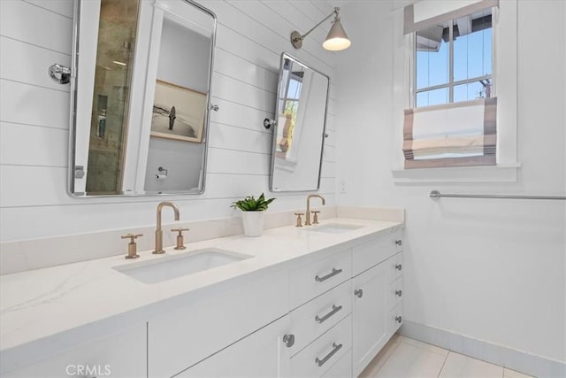 910 28th St, Manhattan Beach, CA 90266 - full bathroom featuring double vanity, healthy amount of natural light, and tile patterned flooring