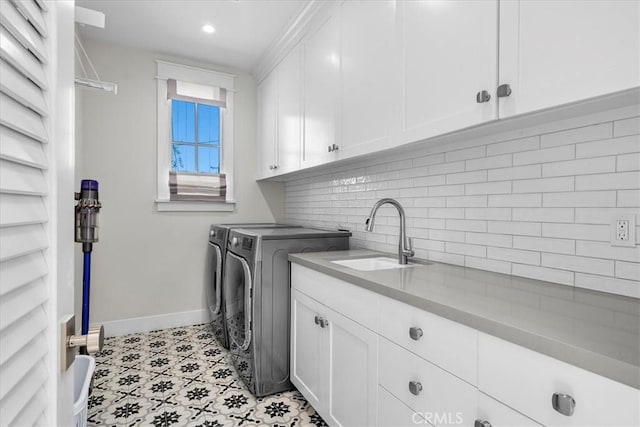 910 28th St, Manhattan Beach, CA 90266 - washroom featuring cabinet space, washing machine and clothes dryer, and recessed lighting