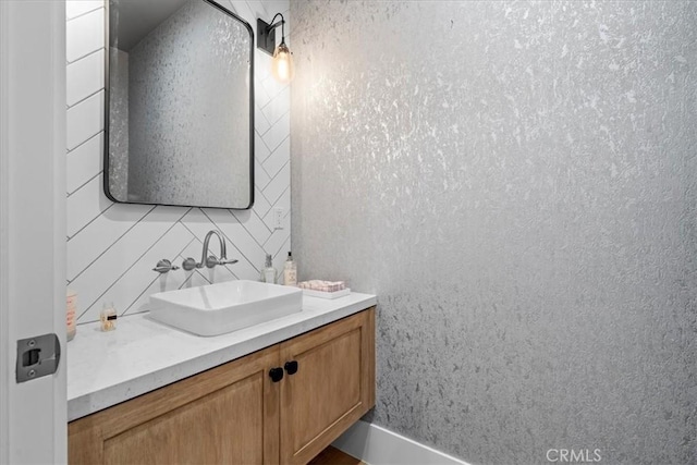 910 28th St, Manhattan Beach, CA 90266 - bathroom featuring vanity and tasteful backsplash