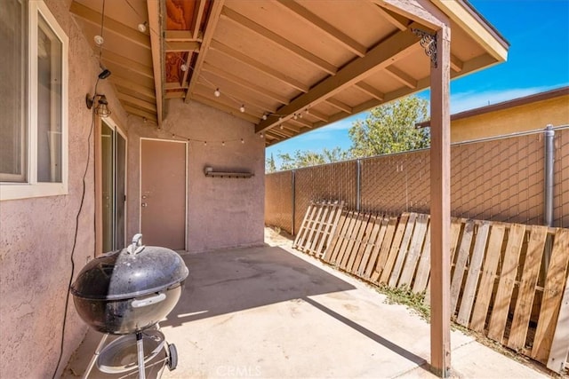 5616 Cahuilla Ave Unit 29, Palms, CA 92277 - fenced backyard with a patio and area for grilling