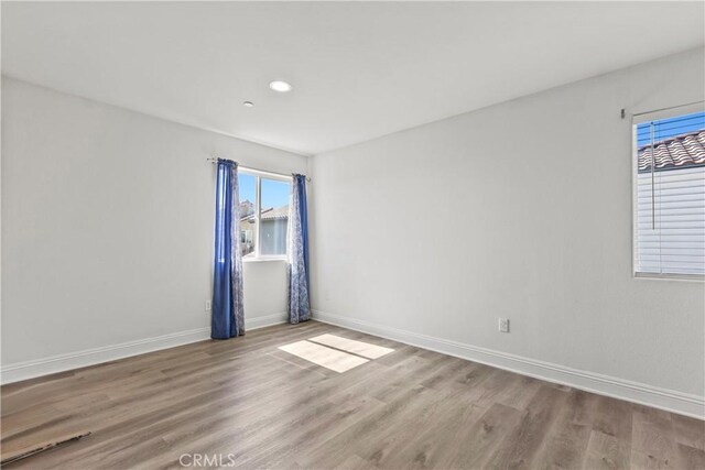 4429 La Joya Dr, Guadalupe, CA 93434 - empty room with wood finished floors and recessed lighting