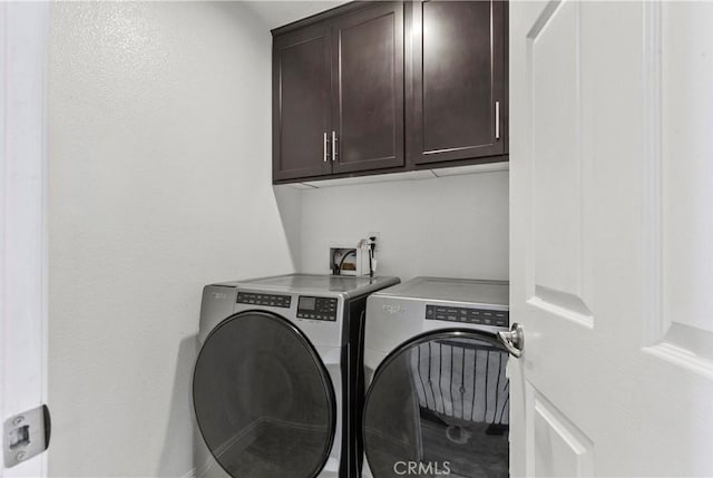 4429 La Joya Dr, Guadalupe, CA 93434 - laundry area with washer and dryer and cabinet space