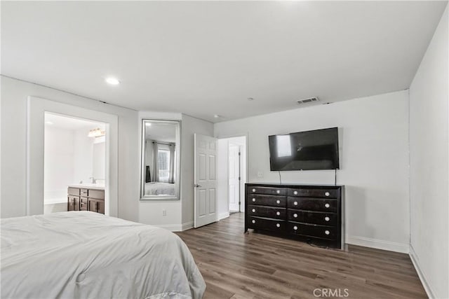 4429 La Joya Dr, Guadalupe, CA 93434 - bedroom with wood finished floors, recessed lighting, and ensuite bath