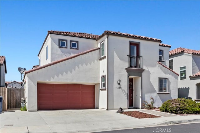 4429 La Joya Dr, Guadalupe, CA 93434 - mediterranean / spanish-style house with an attached garage, stucco siding, driveway, and a tile roof