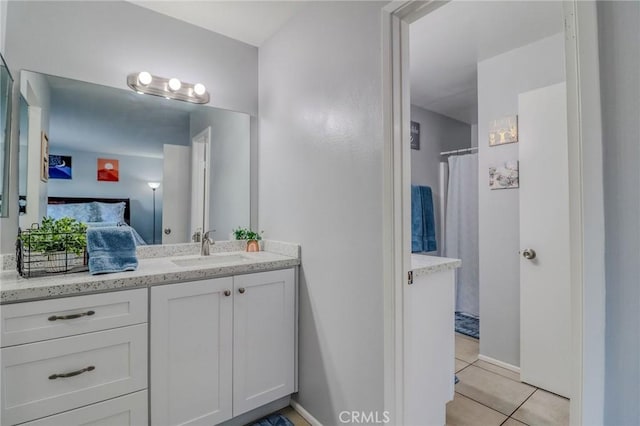 4863 Jackson St Unit B, Riverside, CA 92503 - full bath with vanity, tile patterned flooring, and a shower with shower curtain