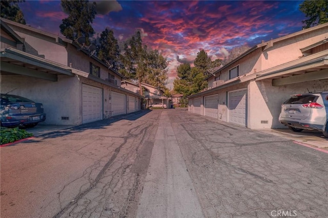 4863 Jackson St Unit B, Riverside, CA 92503 - view of asphalt road featuring community garages