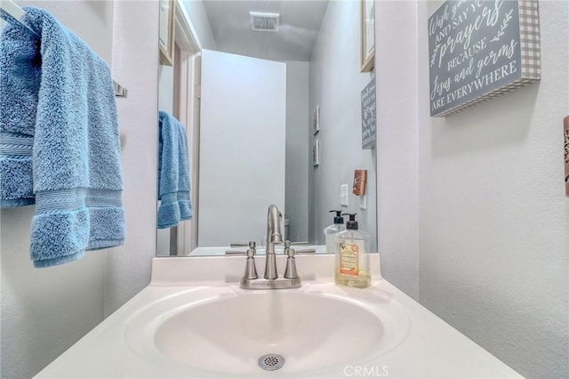 4863 Jackson St Unit B, Riverside, CA 92503 - bathroom featuring vanity and a textured wall
