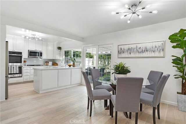 26342 Via Conchita, Mission Viejo, CA 92691 - dining room featuring a chandelier and light wood finished floors