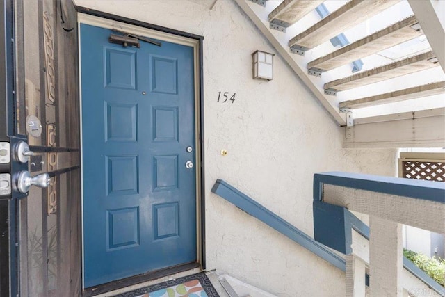2224 River Run Dr Unit 154, San Diego, CA 92108 - doorway to property with stucco siding