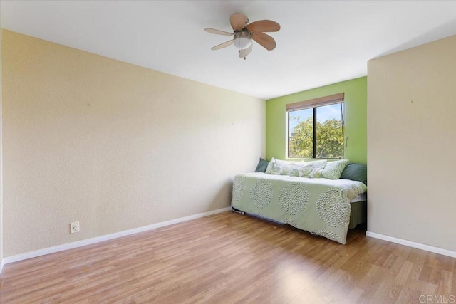 2224 River Run Dr Unit 154, San Diego, CA 92108 - bedroom featuring light wood-type flooring and ceiling fan
