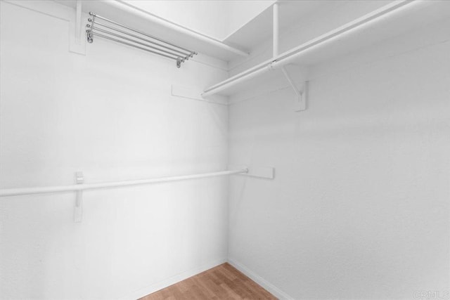 2224 River Run Dr Unit 154, San Diego, CA 92108 - walk in closet with light wood-style floors