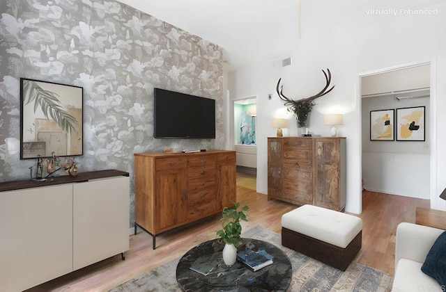 2224 River Run Dr Unit 154, San Diego, CA 92108 - living area featuring light wood finished floors and wallpapered walls