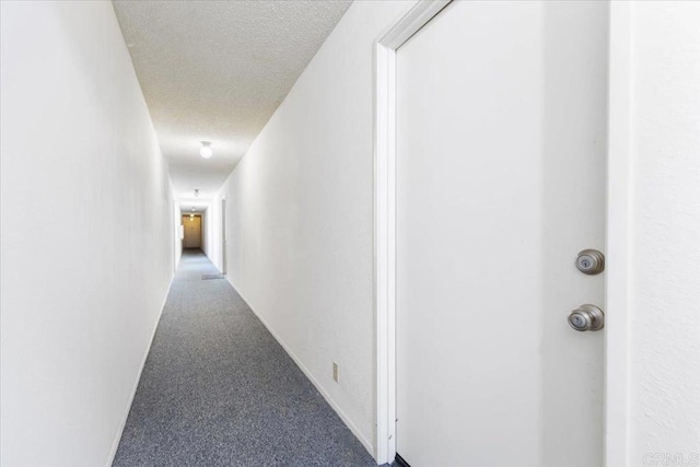2224 River Run Dr Unit 154, San Diego, CA 92108 - corridor with a textured ceiling and carpet