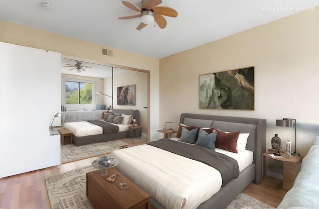 2224 River Run Dr Unit 154, San Diego, CA 92108 - bedroom with wood finished floors, a closet, and a ceiling fan