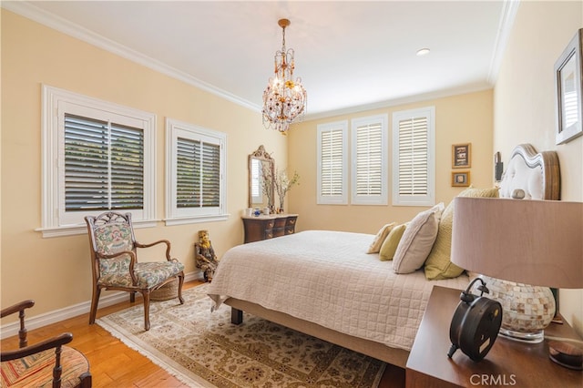 4022 Willowcrest Ave, Studio City, CA 91604 - bedroom featuring ornamental molding, light wood-style flooring, and a chandelier
