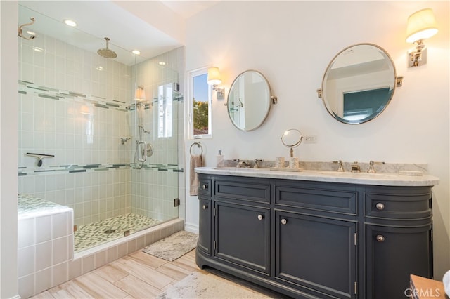 4022 Willowcrest Ave, Studio City, CA 91604 - full bathroom featuring a stall shower, double vanity, and wood finished floors