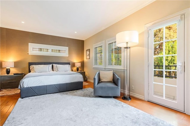 4022 Willowcrest Ave, Studio City, CA 91604 - bedroom featuring wood finished floors and multiple windows