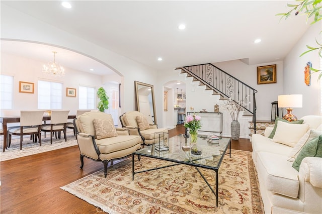 4022 Willowcrest Ave, Studio City, CA 91604 - living room with arched walkways, wood finished floors, stairs, recessed lighting, and a chandelier
