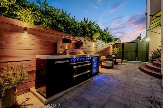 4022 Willowcrest Ave, Studio City, CA 91604 - patio terrace at dusk with a patio