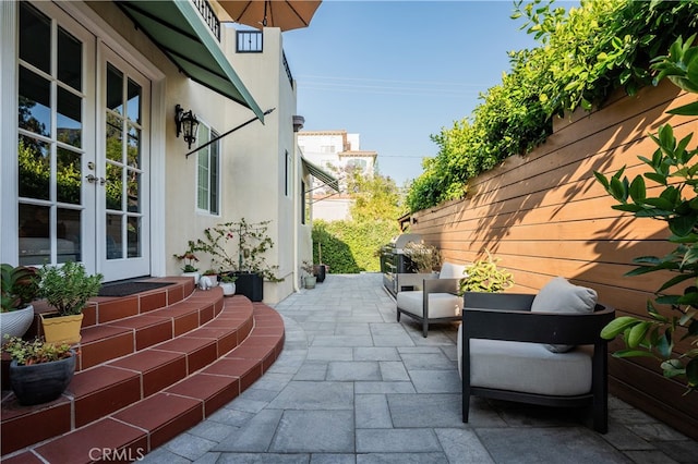 4022 Willowcrest Ave, Studio City, CA 91604 - view of patio / terrace with french doors and grilling area