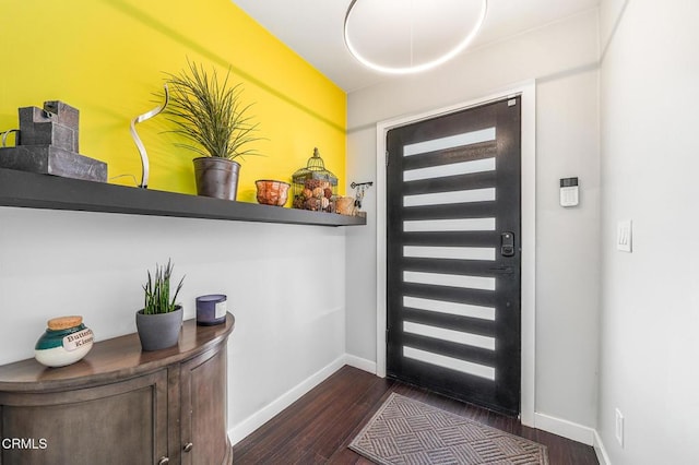 4255 Raynol St, Los Angeles, CA 90032 - entryway featuring dark wood finished floors and baseboards
