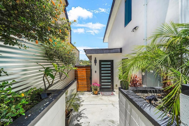 4255 Raynol St, Los Angeles, CA 90032 - doorway to property featuring stucco siding