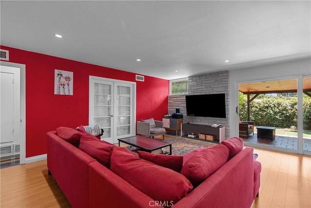 17172 Lahey St, Granada Hills, CA 91344 - living room with light wood-style flooring and recessed lighting