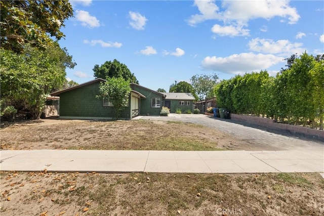 17172 Lahey St, Granada Hills, CA 91344 - view of front of home with an attached garage and driveway