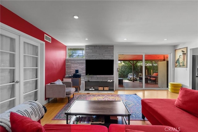 17172 Lahey St, Granada Hills, CA 91344 - living room featuring wood finished floors, a fireplace, and recessed lighting