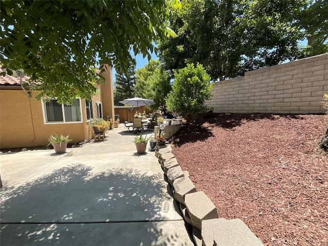 6720 Shaded Wood Pl, Rancho Cucamonga, CA 91701 - fenced backyard with a patio area